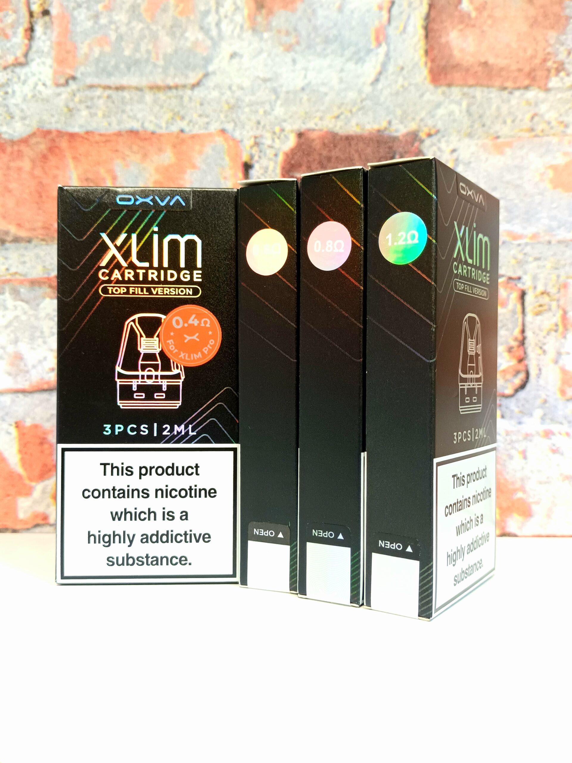 Collection of Xlim pods in front of a brick background