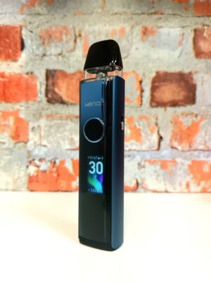 A blue Wenax Q Pro kit in front of a brick background